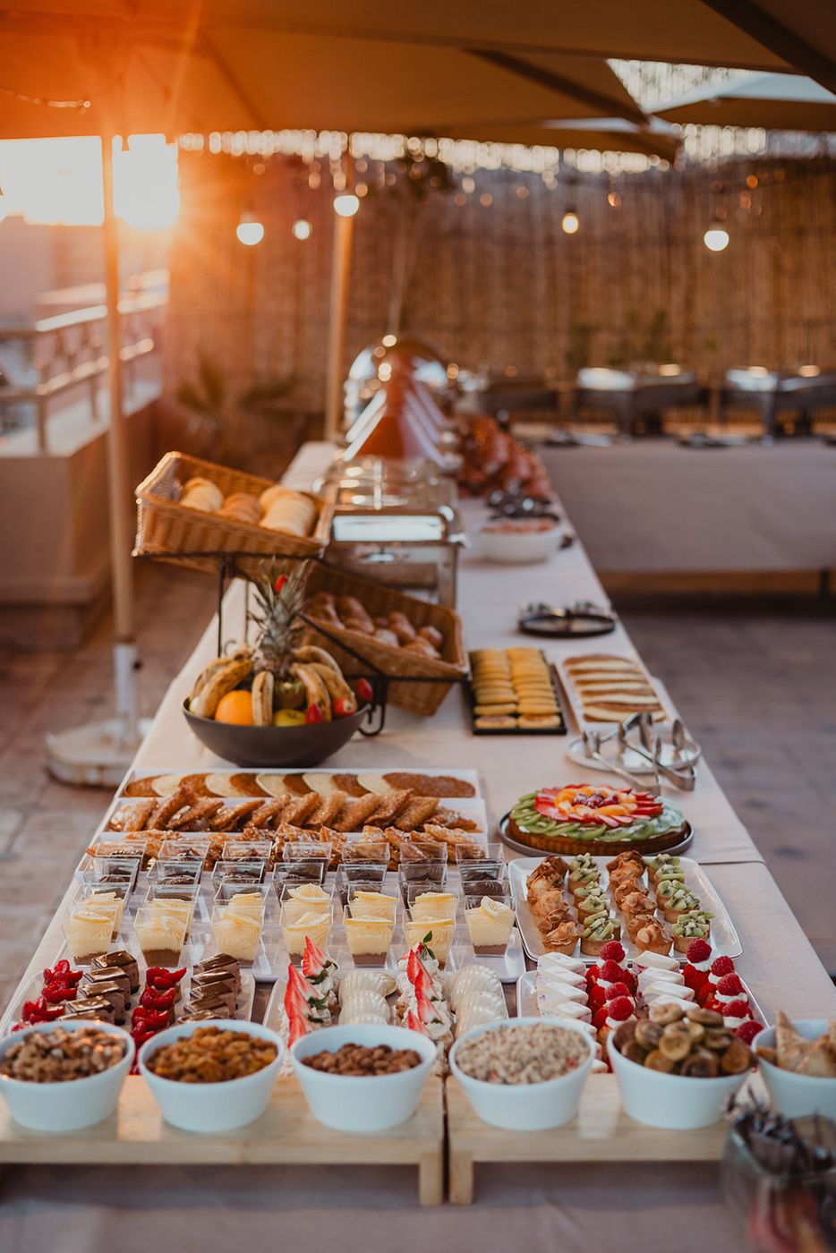 Brunch buffet on the terrace at sunset